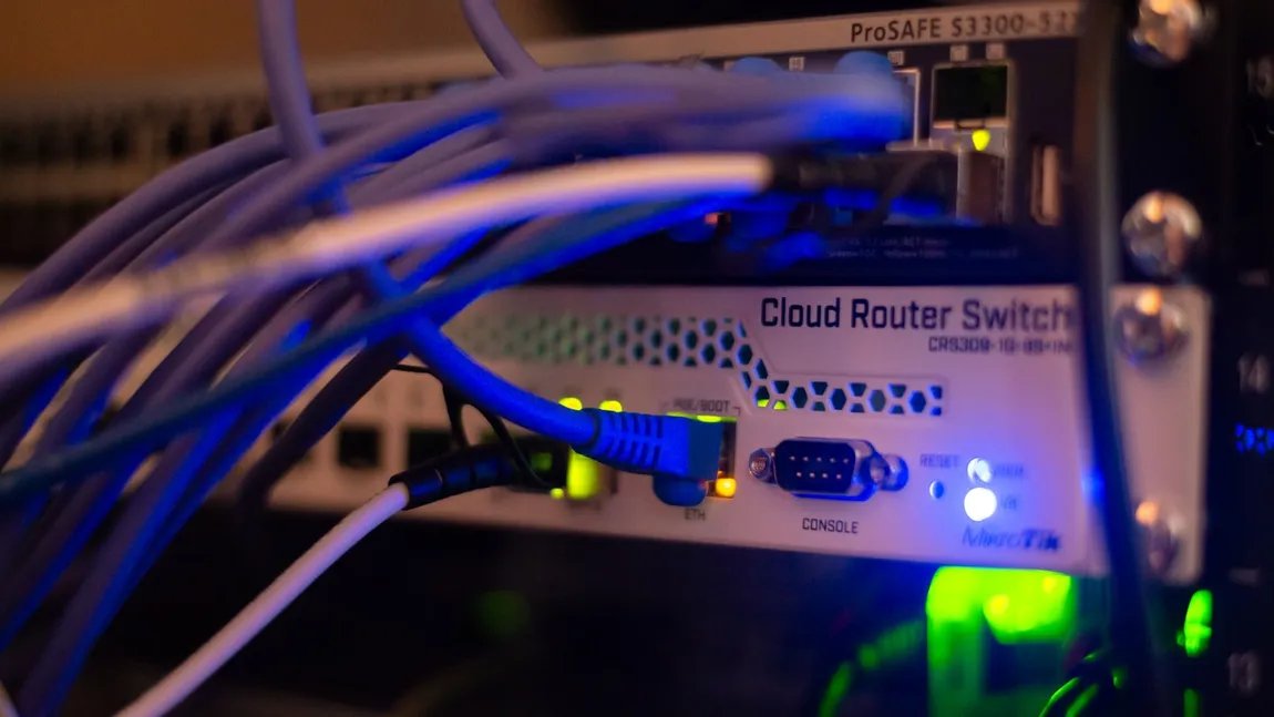 Network cabling inside a server rack, the managed infrastructure a Windows workload runs on