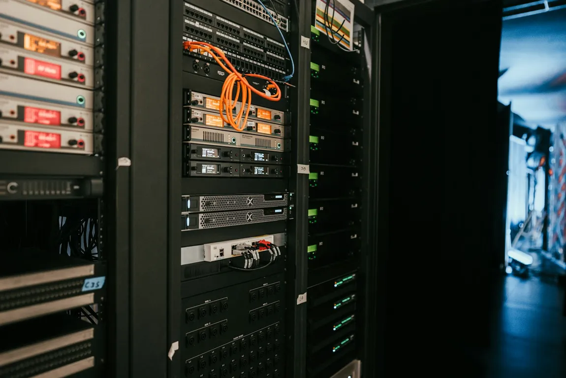 A server rack in a datacenter, the infrastructure behind managed Windows Server hosting