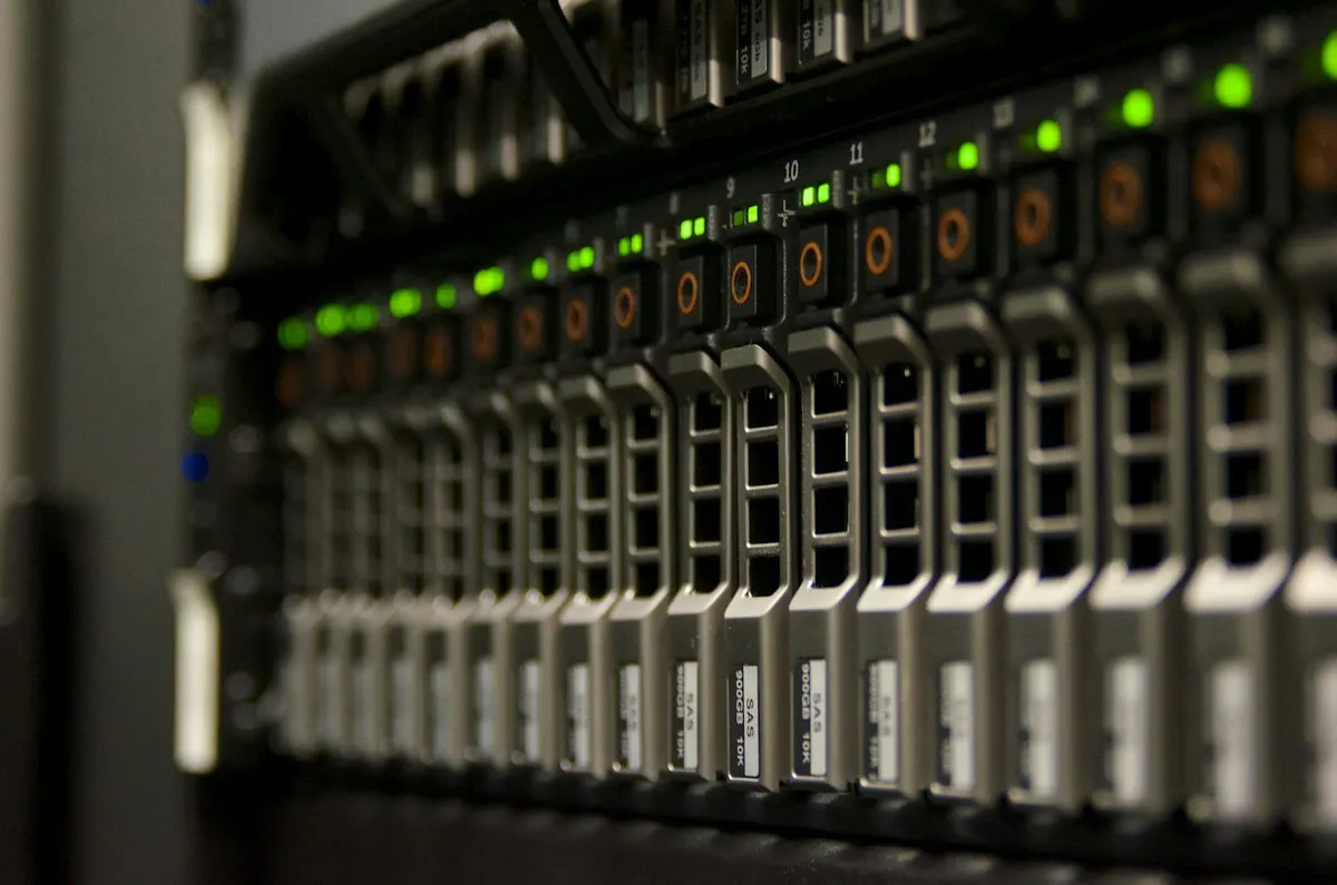 Rack servers with hot-swap SAS drive bays and green activity lights, the kind of compute node an OpenStack upgrade reaches last